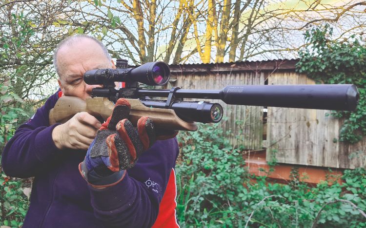 Gary Chillingworth shooting an air rifle standing